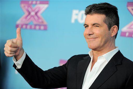 Cowell Having Love Child With Friend's Wife: Sources