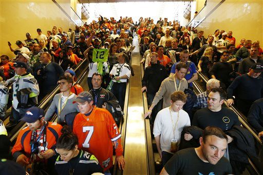 Fans Pass Out in 'Sauna' Transit to Super Bowl