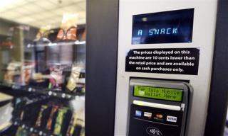 Iowa man loses job over Twix stuck in vending machine