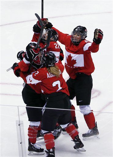 Canada Stuns US in OT for Women's Hockey Gold