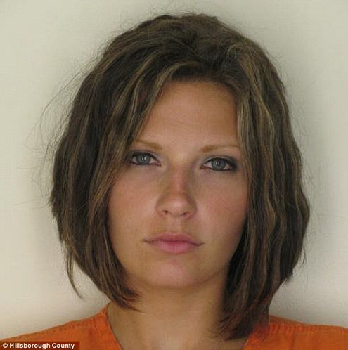 'Attractive Convict' Sues Over Her Mugshot