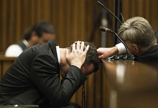 Pistorius Gags as Trial Turns Graphic