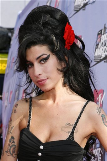 Winehouse Faces Jail After Violent Bender