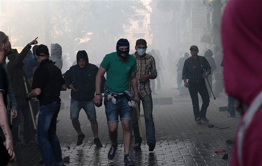 Fire Kills Dozens Amid Ukraine Clashes