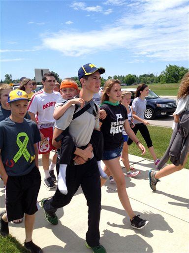 8th-Grader Carries Brother 40 Miles for Cerebral Palsy