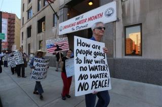 Detroit Protesters Try to Block Water Shutoff Trucks