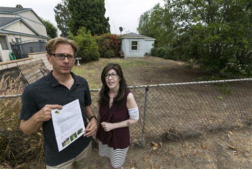 Couple Could Be Fined $500 if They Water Lawn, $500 if They Don't