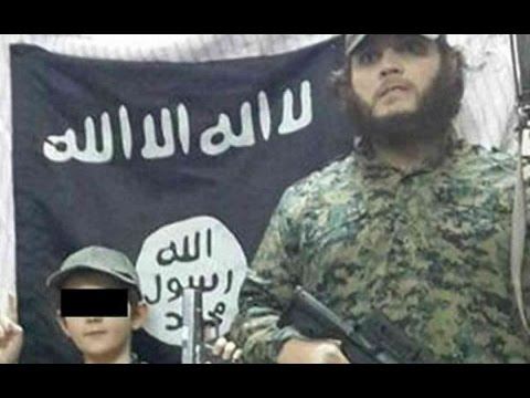 'Barbaric': Terrorist's Boy Poses With Severed Head