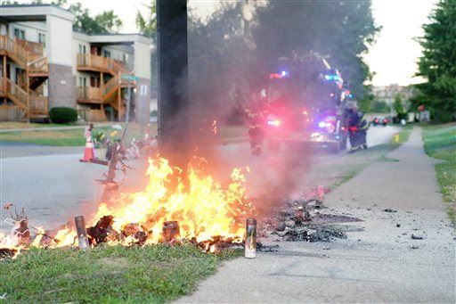 Michael Brown Memorial Burns, Stirs New Unrest in Ferguson