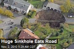 Huge Sinkhole Eats Road