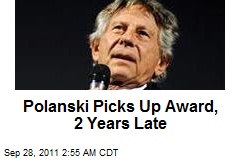 Polanski Picks Up Award, 2 Years Late