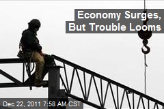Economy Surges, But Trouble Looms