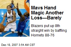 Mavs Hand Magic Another Loss&mdash;Barely