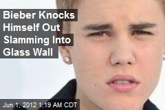 Bieber Knocks Himself Out Crashing Into Glass Wall