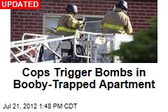 Cops Trying to Enter Booby-Trapped Apartment