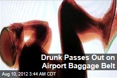 Drunk Passes Out on Airport Baggage Belt