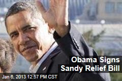 Obama Signs Sandy Relief Bill