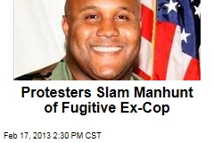 Crowd Protests Manhunt of Fugitive Ex-Cop