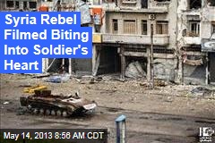 Syria Rebel Filmed Biting Into Soldier&#39;s Heart