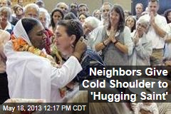 Neighbors Give Cold Shoulder to &#39;Hugging Saint&#39;