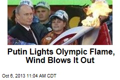 Putin Lights Olympic Flame, Wind Blows It Out