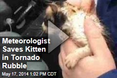 Meteorologist Saves Kitten in Tornado Rubble