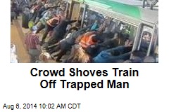 Crowd Just Shoves Train Off Guy Stuck in Gap