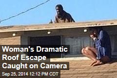 Woman&#39;s Dramatic Roof Escape Caught on Camera