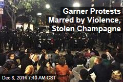 Garner Protests Marred by Violence, Stolen Champagne