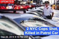 2 NYC Cops Shot in Car; One Dead