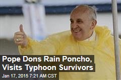 Pope Dons Rain Poncho, Visits Typhoon Survivors