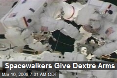 Spacewalkers Give Dextre Arms
