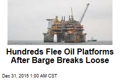 Hundreds Flee Oil Platforms After Barge Breaks Loose