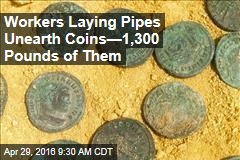 Workers Laying Pipes Unearth Coins&mdash;1,300 Pounds of Them