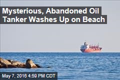 Mysterious, Abandoned Oil Tanker Washes Up on Beach