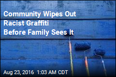 Community Wipes Out Racist Graffiti Before Family Sees It