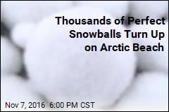 Perfect Snowballs Turn Up on Arctic Beach