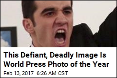 Assassin&#39;s Defiant Stance Is World Press Photo of the Year
