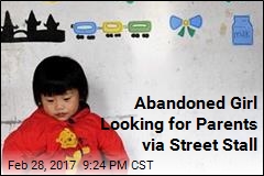 Young Girl Tries to Find Parents via Street Stall