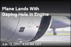 Plane Lands With Gaping Hole in Engine