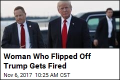 Woman Who Flipped Off Trump Gets Fired