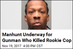 Manhunt Underway for Gunman Who Killed Rookie Cop