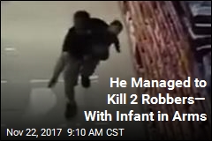 Off-Duty Cop With Infant in Arms Kills Robbers