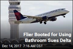 Flier Booted for Using Bathroom Sues Delta