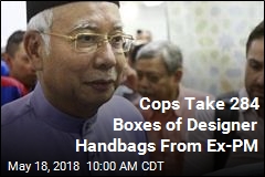 Cops Take 284 Boxes of Designer Handbags From Ex-PM