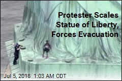 Protester Scales Statue of Liberty, Forces Evacuation