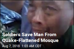 Soldiers Save Man From Quake-Flattened Mosque