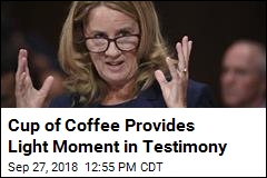 Cup of Coffee Provides Light Moment in Testimony