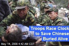 Troops Race Clock to Save Chinese Buried Alive