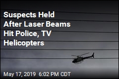 Suspects Held After Laser Beams Hit Police, TV Helicopters